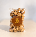 Cookies & Cream Caramel Popcorn in a clear bag with a Trilby's label