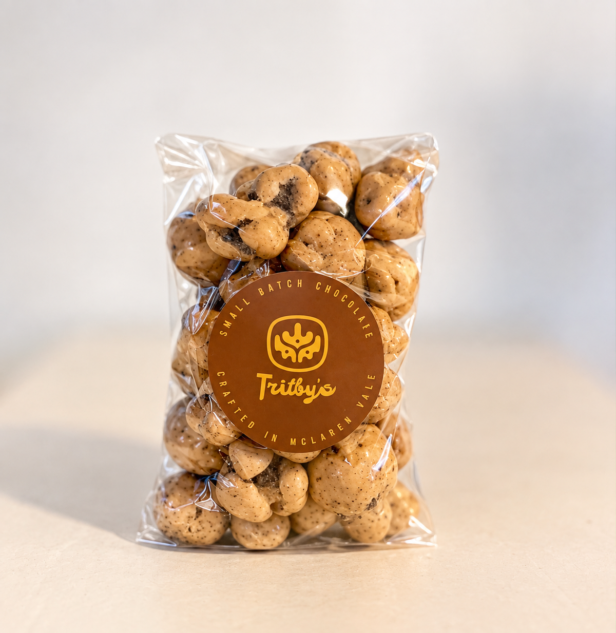 Cookies & Cream Caramel Popcorn in a clear bag with a Trilby's label