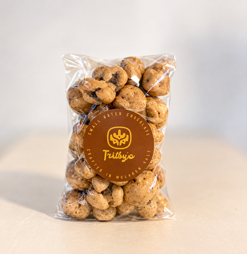 Cookies & Cream Caramel Popcorn in a clear bag with a Trilby's label