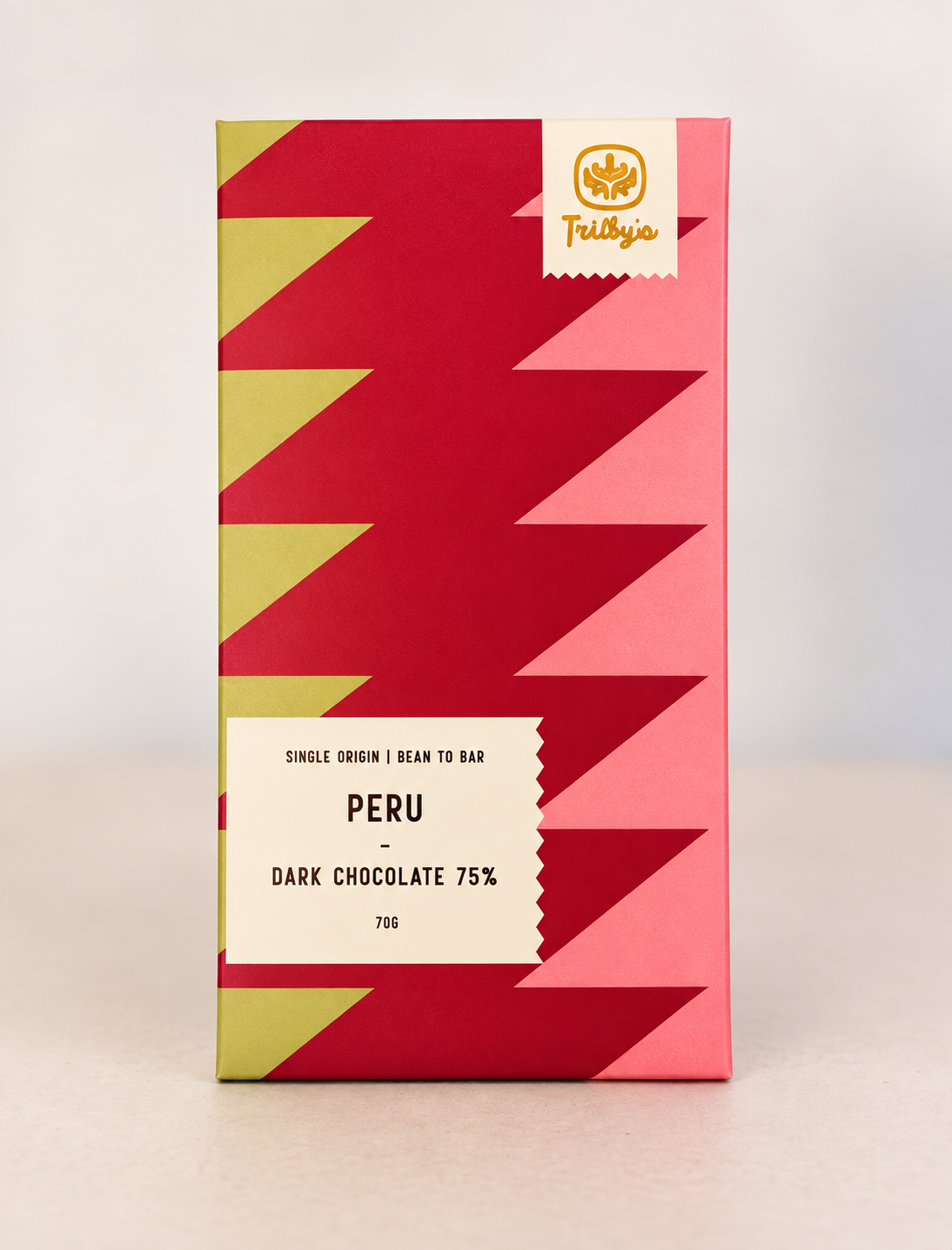 Single Origin Peru 75% dark chocolate bar in a red and pink zigzag wrapper