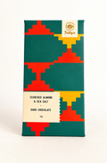 Scorched Almond & Sea Salt dark chocolate bar in a green, red and yellow patterned wrapper