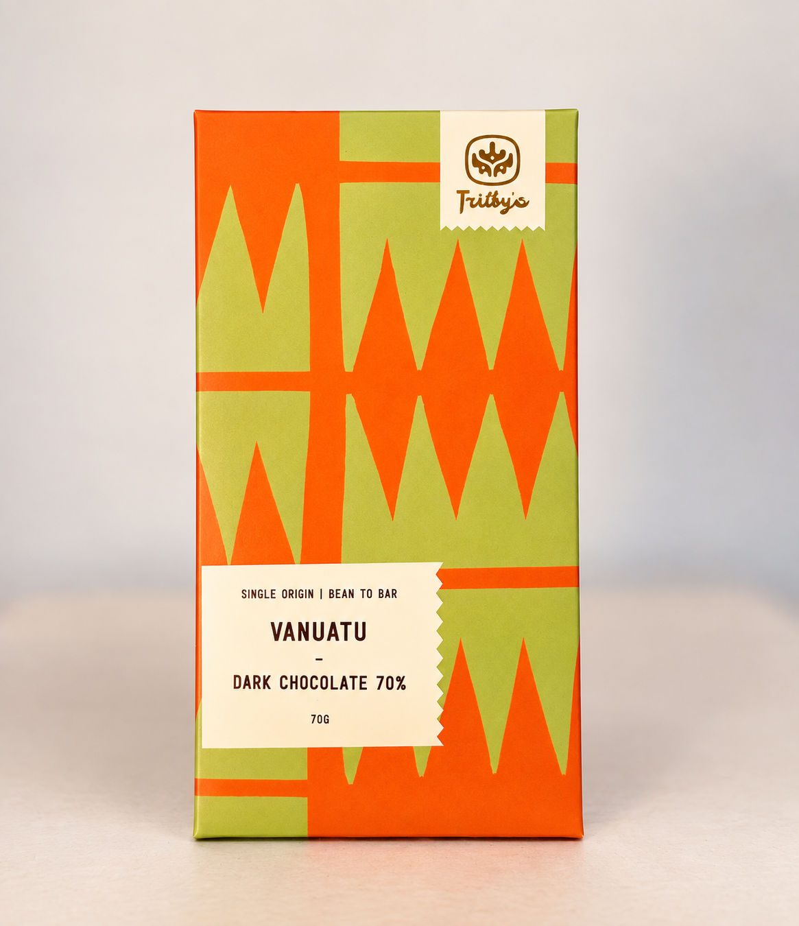 Single Origin Vanuatu 70% dark chocolate bar in an orange and green patterned wrapper